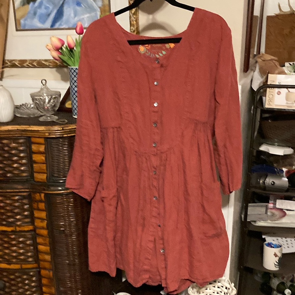 Gudrun Sjoden L rust shirt with front pockets.